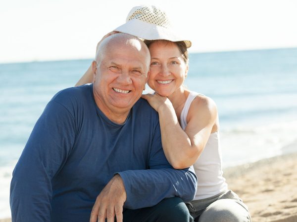 mature couple at beach best time of the day to inject human growth hormone