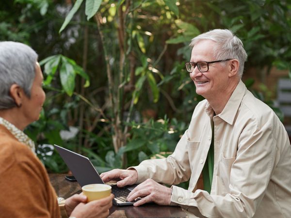 mature man and woman in cafe outside