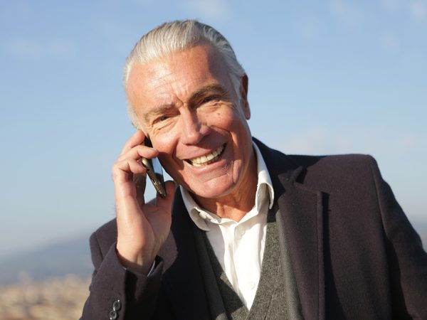 mature man talking phone selank peptide treatment concept